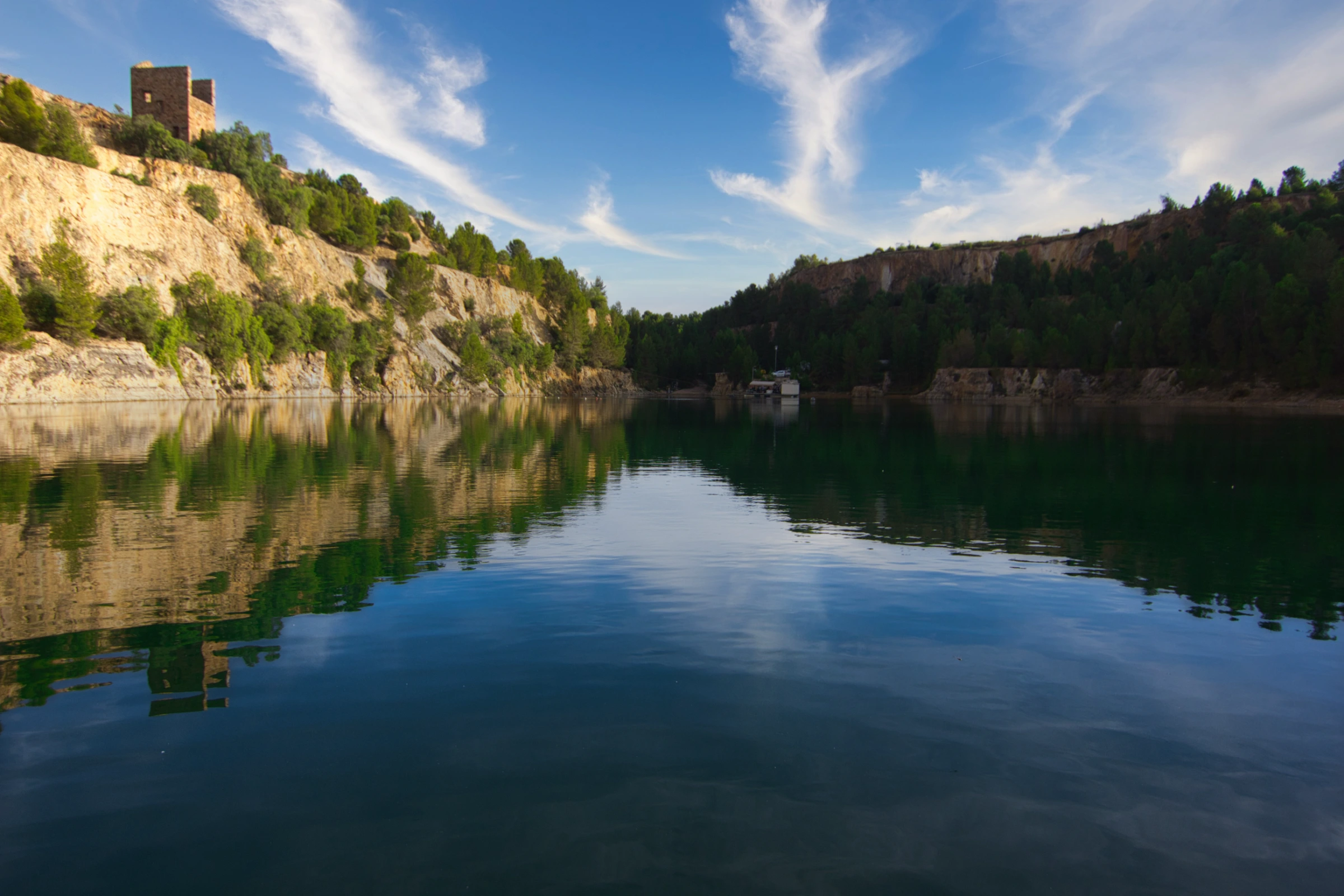 The Burra quarry training site with the heritage stone engine house perched on the cliff above the water